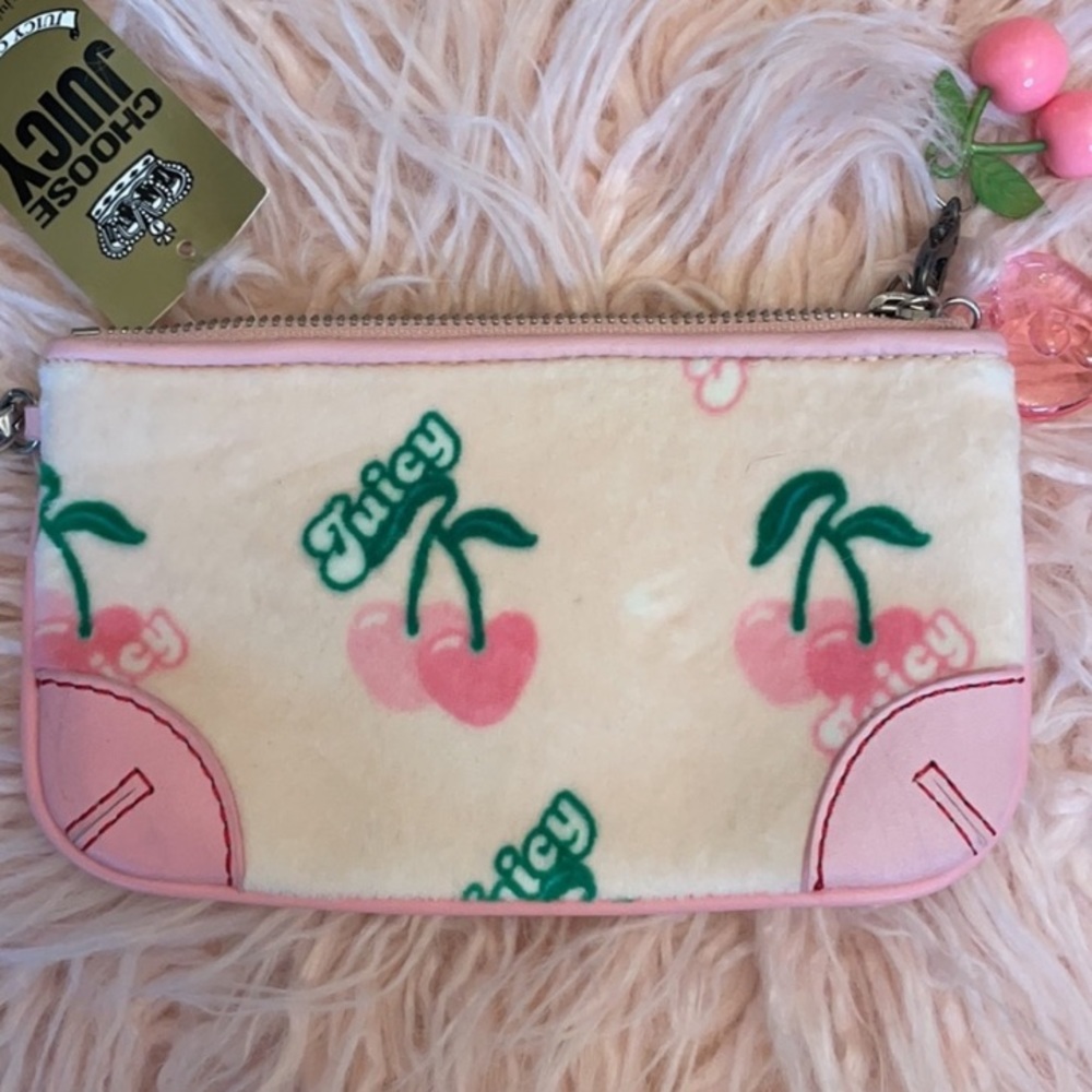 ISO Juicy couture cherry wristlet !!